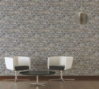 Die Ziegelwand Tapete Grau mit 3D Motiv präsentiert sich in zeitlosem Grau und verleiht jedem Raum eine moderne und edle Optik durch das realistische 3D-Motiv im Ziegel-Stil, es wirkt wie eine echte Ziegelwand.